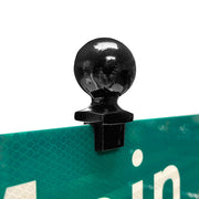 Ball finial street-blade topper. Powder-coated black and mounted to a traffic green reflective street-blade.