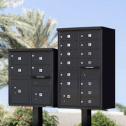 Two Florence Vital 1570 Series CBU Mailboxes in black. Box on right is a 4 unit cbu with 2 secure parcel doors on the bottom and one outgoing mail slot above the second parcel box. The type on the left is a 13 unit cbu with outgoing mail slot below unit number 10 and one parcel door. All have standard silver placard door ID’s. 1570-13 lifestyle and 1570-4T5
