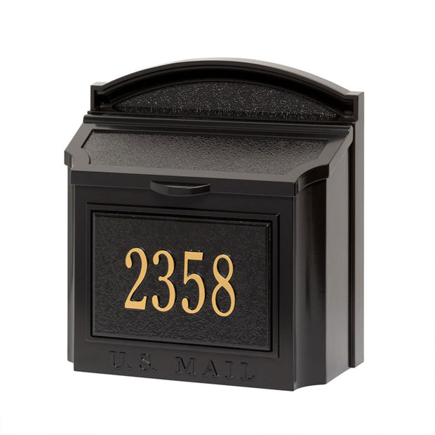 wall mailbox with black and gold plaque