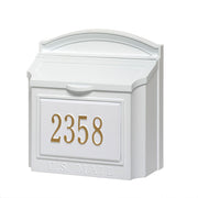 white wall mailbox with white and gold house number plaque