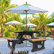 town square table with umbrella on cement patio