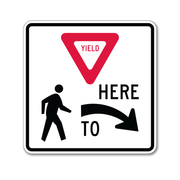 crosswalk sign for yield here for pedestrian, right arrow
