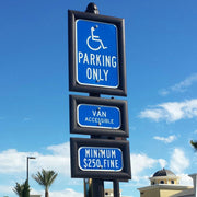  accessible parking signs in black extruded aluminum sign fames installed on a decorative post