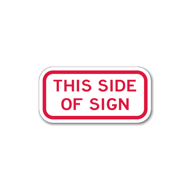 This Side of Sign text printed in red on white reflective background.
