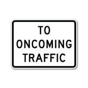 text: to oncoming traffic printed in black on white background